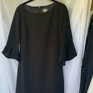 Vince Camuto black mini dress with tulip hem and sleeves